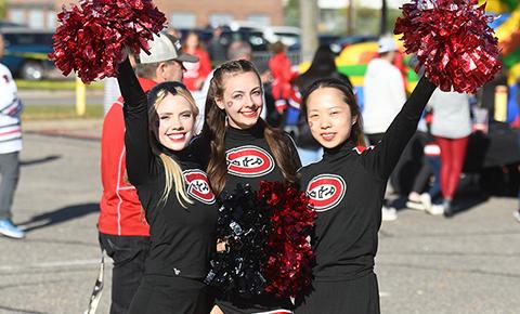 SCSU cheerleaders pose for a photo